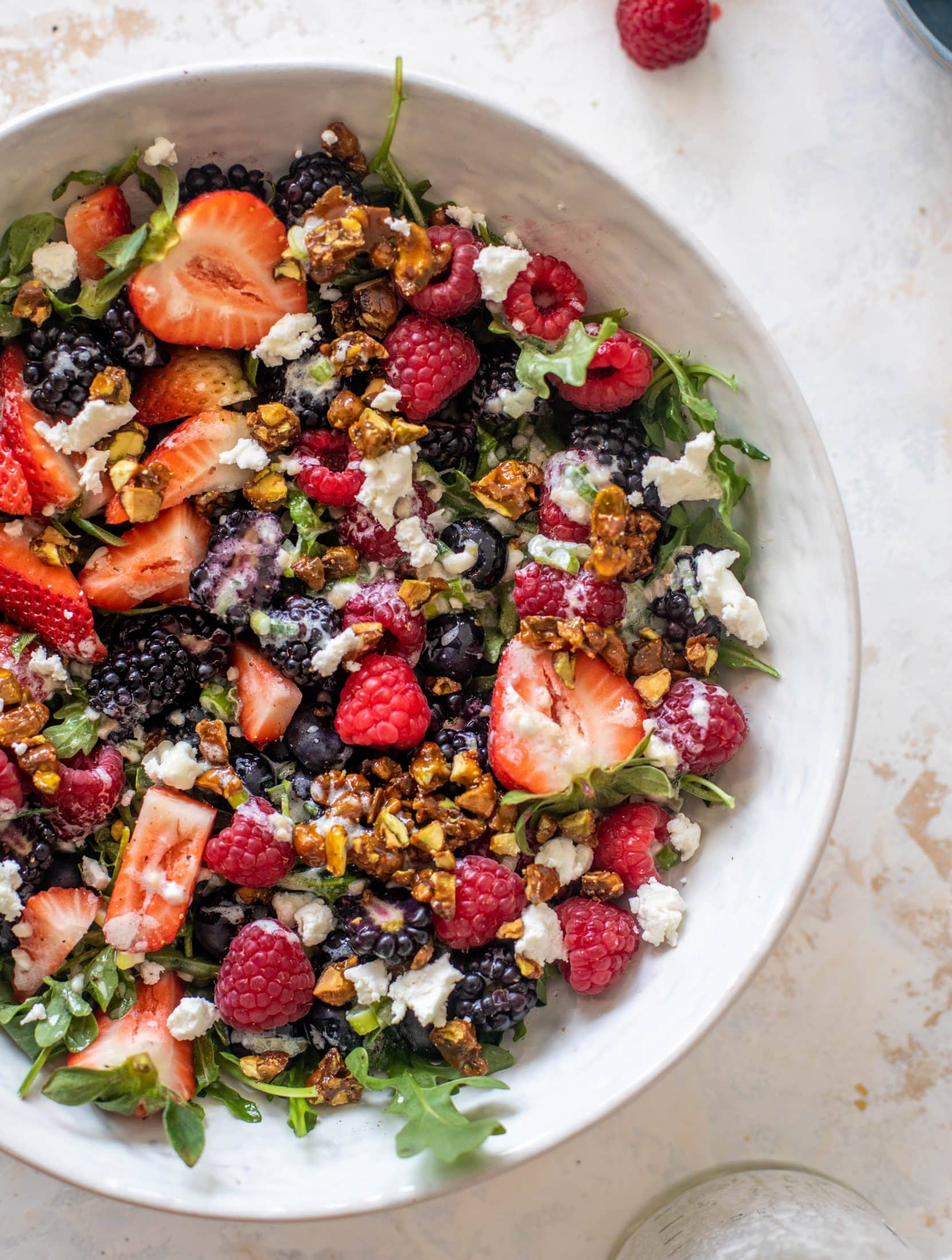 red white and berry arugula salad